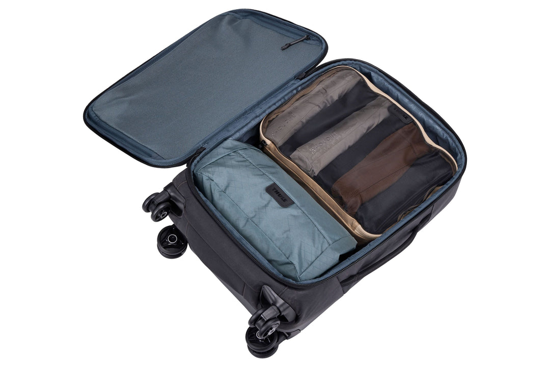 Thule Packing Cube Medium Gentle Beige packed in luggage